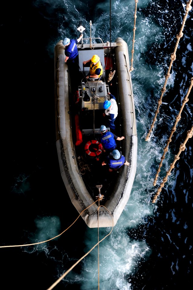 US Navy 100307-N-6604E-009 Sailors assigned the Nimitz-class aircraft carrier USS Dwight D. Eisenhower (CVN 69) conduct a man overboard drill in a rigid-hull inflatable boat. Dwight D. Eisenhower is on a six-month deployment