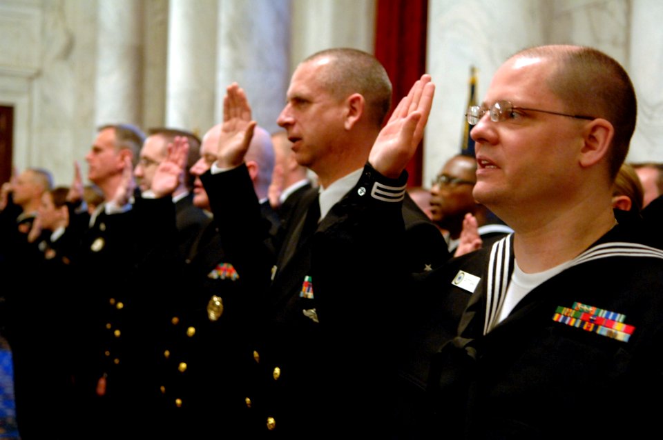 US Navy 100305-N-9818V-158 Sailors reenlist at the 95th Navy Reserve Anniversary and Reenlistment ceremony at the Kennedy Caucus Room in the Russell Senate Office Building