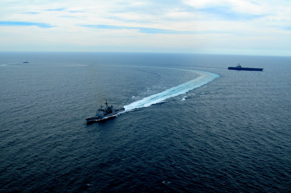US Navy 100308-N-0808V-620 USS Bunker Hill (CG 52) and the Argentina navy frigate ARA Gomez Roca (P 46) break away from USS Carl Vinson (CVN 70) after completing tactical maneuvering exercises