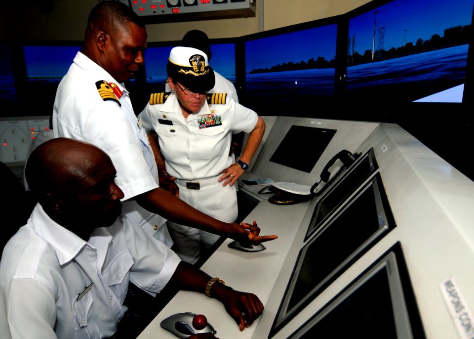 US Navy 100308-N-7948C-260 Capt. Cindy Thebaud, commander of Africa Partnership Station (APS) West, tours a navigation simulator at the Joint Maritime Training Center at Nigeria Naval Station Quorra