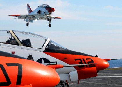US Navy 100308-N-7908T-228 A T-45A Goshawk training aircraft assigned to Training Wing (TRAWING) 1 lands aboard the aircraft carrier USS George H.W. Bush (CVN 77)