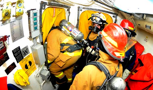 US Navy 100309-N-4774B-136 Sailors conduct firefighting drills during a training evolution