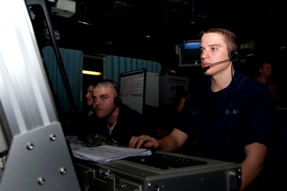 US Navy 100306-N-8936G-001 Air Traffic Controller Airman John Ammons, left, from Linden, N.C., and Air Traffic Controller Airman Dennis Hatvany, from Beriea, Ohio