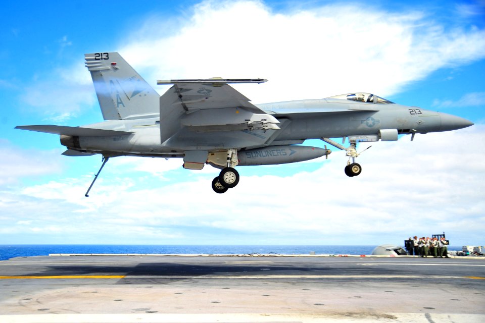 US Navy 100310-N-2953W-491 An F-A-18 Super Hornet prepares to land on the flight deck of USS Carl Vinson (CVN 70)