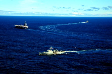 US Navy 100307-N-0808V-656 The aircraft carrier USS Carl Vinson (CVN 70) and the guided-missile cruiser USS Bunker Hill (CG 52) break away from the Uruguayan navy frigate Uruguay (ROU 1)