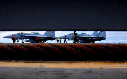 US Navy 100310-N-6006S-494 Sailors aboard the aircraft carrier USS Carl Vinson (CVN 70) prepare for flight operations