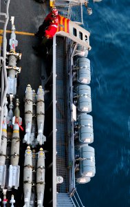 US Navy 100306-N-3595W-004 Sailors assigned to the weapons department of the Nimitz-class aircraft carrier USS Dwight D. Eisenhower (CVN 69) stand a munitions watch on the flight deck