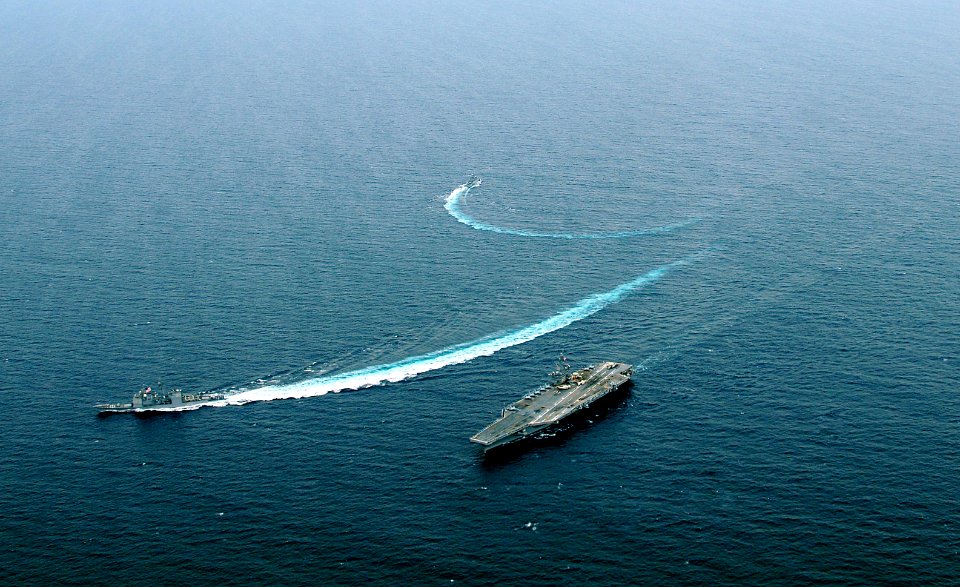 US Navy 100308-N-0808V-602 USS Bunker Hill (CG 52) and the Argentina navy frigate ARA Gomez Roca (P 46) break away from USS Carl Vinson (CVN 70) after completing tactical maneuvering exercises