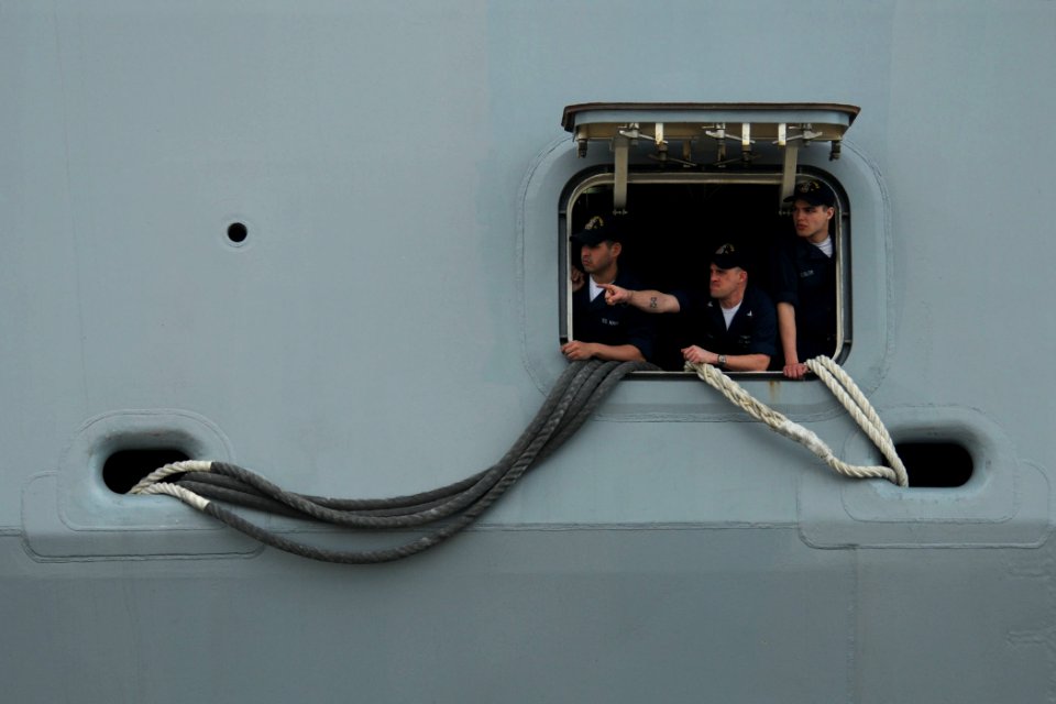 US Navy 100310-N-8590G-009 Sailors aboard the amphibious transport dock ship USS New York (LPD 21) observe the pier as New York approaches Naval Station Mayport