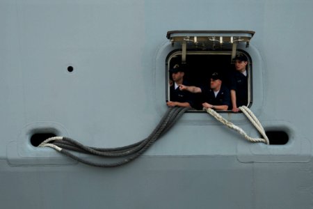 US Navy 100310-N-8590G-009 Sailors aboard the amphibious transport dock ship USS New York (LPD 21) observe the pier as New York approaches Naval Station Mayport