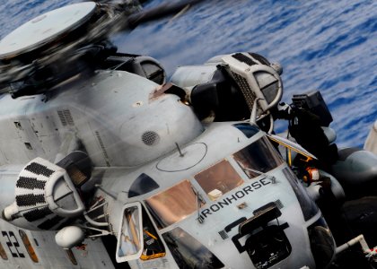 US Navy 100308-N-8655E-014 Plane captains conduct pre-flight checks on an MH-53E Sea Dragon helicopter assigned to Marine Heavy Helicopter Squadron (HMH) 461 (Reinforced) aboard the multipurpose amphibious assault ship USS Bata