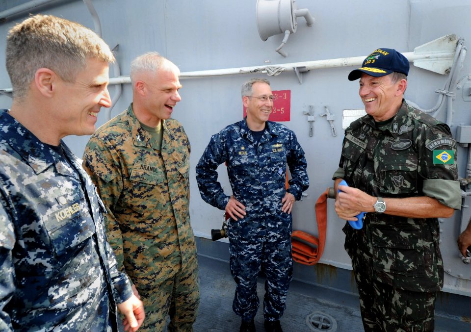 US Navy 100311-N-5961C-017 Brazilian army Maj. Gen. Floriano Peixoto Vieira Neto, right, force commander of the U.N. Stabilization Mission in Haiti, meets with Sailors aboard the amphibious assault ship USS Bataan (LHD 5)