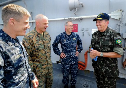 US Navy 100311-N-5961C-017 Brazilian army Maj. Gen. Floriano Peixoto Vieira Neto, right, force commander of the U.N. Stabilization Mission in Haiti, meets with Sailors aboard the amphibious assault ship USS Bataan (LHD 5)