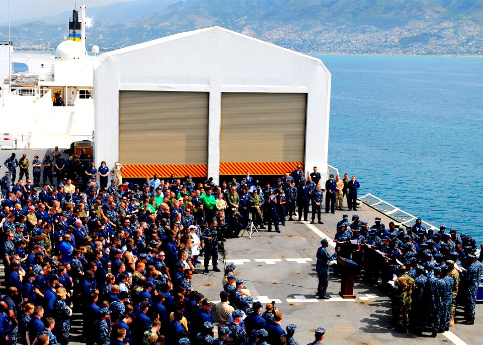 US Navy 100309-N-4378P-097 Haitian-American Sailors embarked aboard the Military Sealift Command hospital ship USNS Comfort (T-AH 20) sing Ayiti Cheri (Haiti My Darling) in Creole photo