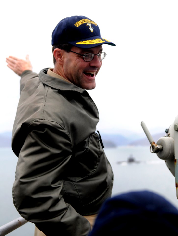 US Navy 100312-N-7280V-173 Vice Adm. John M. Bird, commander of U.S. 7th Fleet, waves at a Republic of Korea submarine as U.S. 7th Fleet command ship USS Blue Ridge (LCC 19) pulls into Chinhae Naval Base