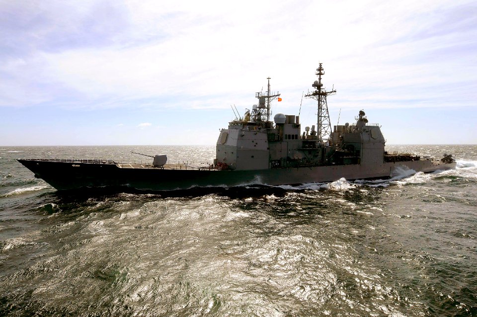 US Navy 100311-N-4275C-138 USS Bunker Hill (CG 52) approaches the starboard side of USS Carl Vinson (CVN 70) for a refueling at sea