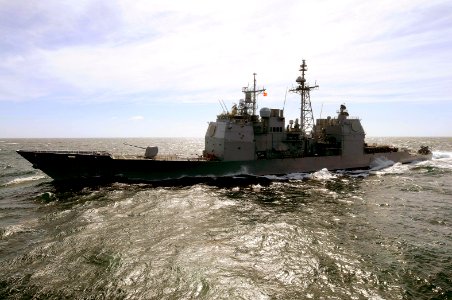 US Navy 100311-N-4275C-138 USS Bunker Hill (CG 52) approaches the starboard side of USS Carl Vinson (CVN 70) for a refueling at sea
