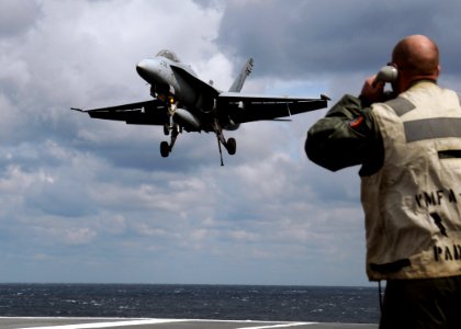 US Navy 100314-N-9116S-731 An F-A-18C Hornet assigned to Strike Fighter Squadron (VFA) 106 lands aboard the aircraft carrier USS George H.W. Bush (CVN 77)