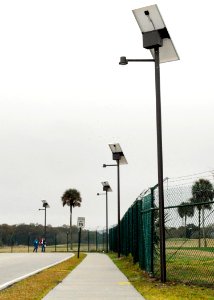US Navy 100312-N-5812W-001 Newly-installed solar LED street lights line a pedestrian sidewalk at Naval Station Mayport, Fla