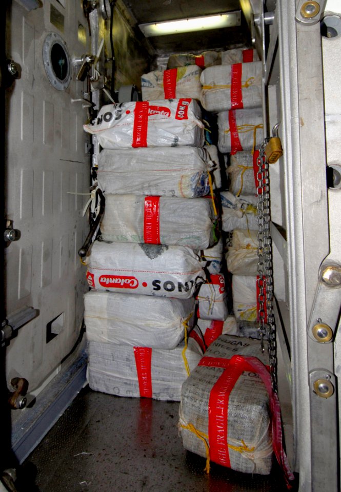 US Navy 100312-N-7058E-194 Bales of cocaine recovered from the southern Caribbean Sea by Sailors and Coast Guardsmen is stored aboard the littoral combat ship USS Freedom (LCS 1)