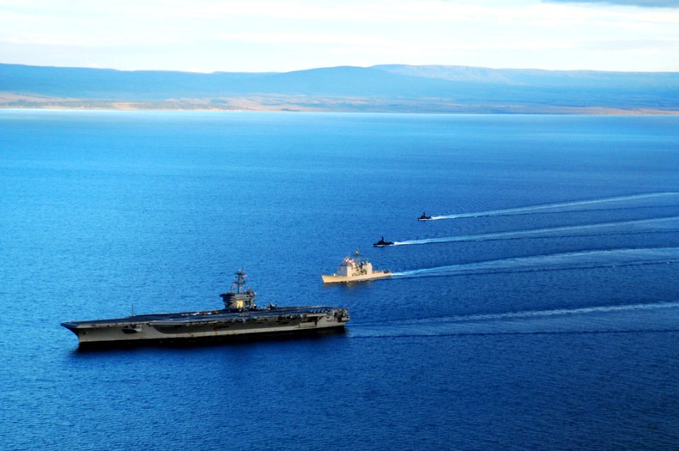 US Navy 100315-N-0808V-297 The Nimitz-class aircraft carrier USS Carl Vinson (CVN 70) performs tactical maneuvering exercises with the guided-missile cruiser USS Bunker Hill (CG 52)