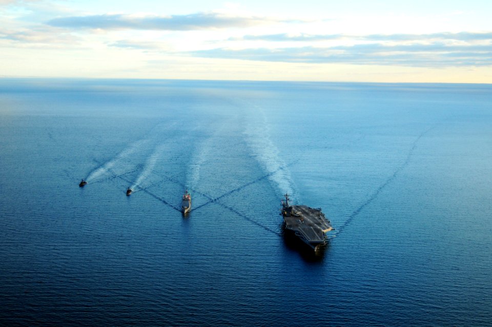 US Navy 100315-N-0808V-578 The Nimitz-class aircraft carrier USS Carl Vinson (CVN 70) performs tactical maneuvering exercises with the guided-missile cruiser USS Bunker Hill (CG 52)