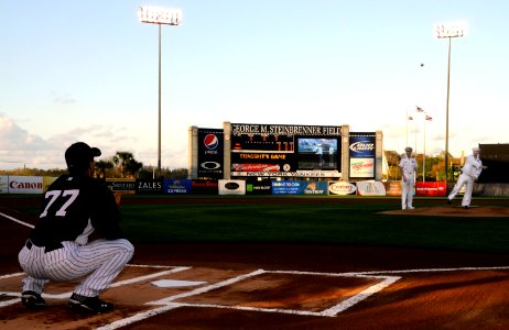 US Navy 100318-N-5366K-209 Navy Counselor 2nd Class Paul Lacey, assigned to Navy Recruiting District Miami, throws out the first pitch at a New York Yankees spring training game at Steinbrenner Field in Tampa, Fla