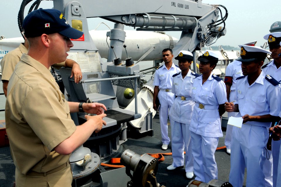 US Navy 100314-N-8335D-371 Ensign Kevin Lewman shows minesweeping gear to midshipmen from the Bangladesh Naval Academy