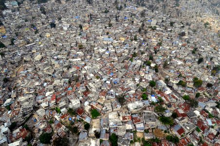 US Navy 100316-N-5961C-020 An aerial view of Port-au-Prince, Haiti shows the proximity of homes, many damaged in a major earthquake and subsequent aftershocks photo