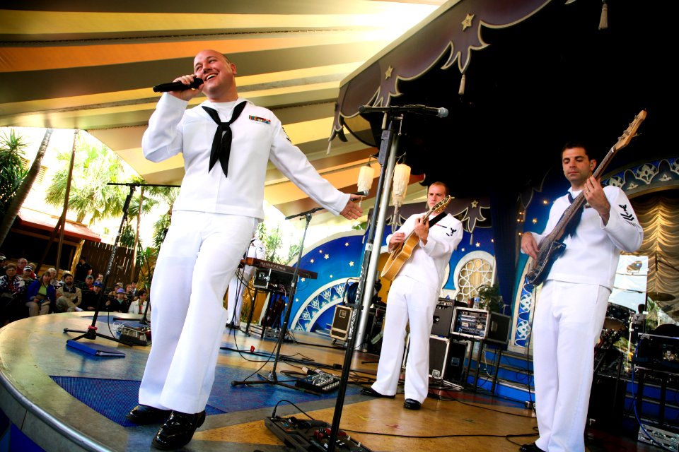 US Navy 100317-N-3271W-015 Musician 3rd Class Sean Meyer, lead singer of the U.S. Navy Band Southeast contemporary ensemble, Pride, performs for patrons at Busch Gardens
