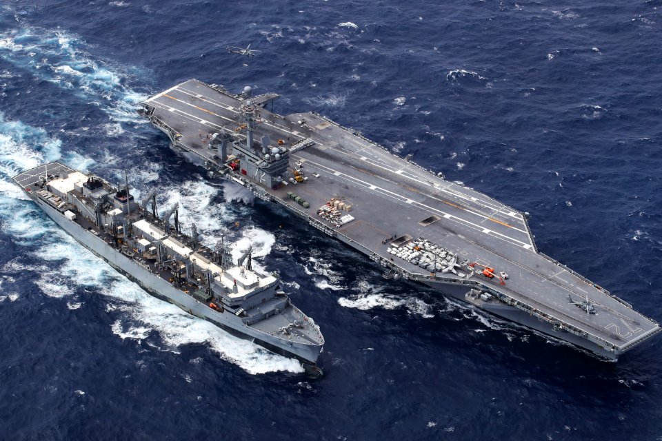 USS Abraham Lincoln performs an ammunition onload with USNS Supply. (26181281997)