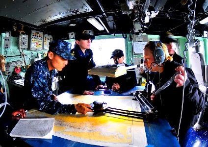US Navy 100316-N-4774B-628 Quartermasters aboard the guided-missile cruiser USS Bunker Hill (CG 52) chart a course as the ship transits the Straight of Magellan