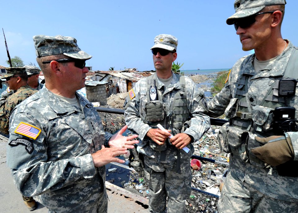 US Navy 100316-N-5961C-006 Lt. Gen. Ken Keen speaks to Lt. Col. David Doyle about the internally displaced persons camps in Doyle's area of responsibility