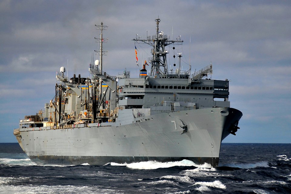 US Navy 100319-N-4774B-461 The Military Sealift Command fast-combat support ship USNS Rainier (T-AOE 7) performs maneuvers at sea after an underway replenishment with the guided-missile cruiser USS Bunker Hill (CG 52)