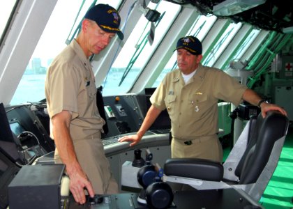 US Navy 100319-N-7058E-373 Cmdr. Randy Garner explains the officer of the deck control station on the bridge to Colombian navy Chief of Naval Operations Vice Adm. Alvaro Echandia