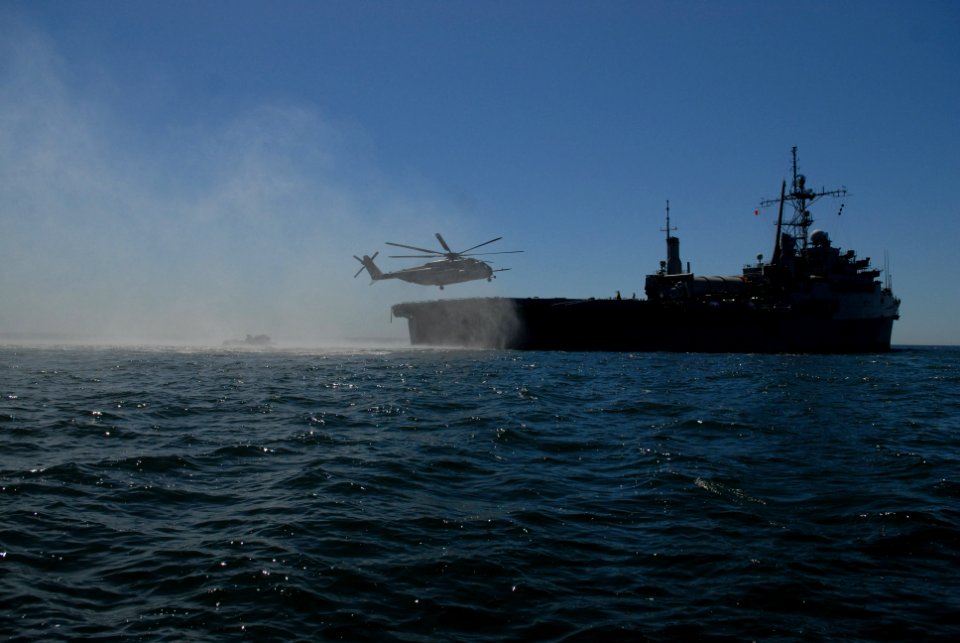 US Navy 100317-N-9706M-155 A CH-53 Sea Stallion helicopter lands on the flight deck of the amphibious transport dock ship USS Dubuque (LPD 8)
