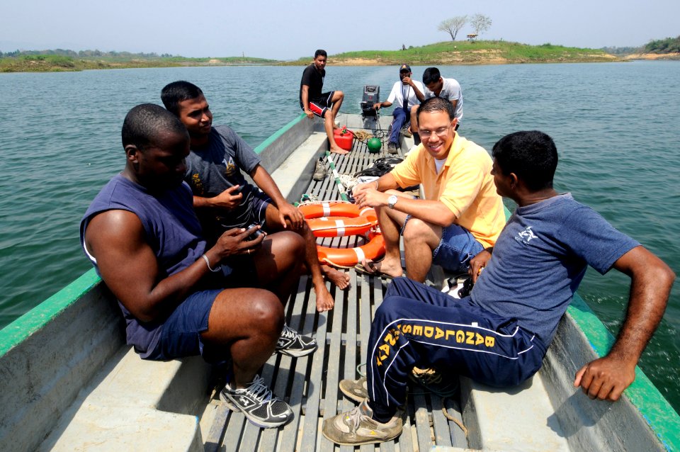 US Navy 100316-N-8335D-085 Logistics Specialist 1st Class Patrick Lampley and Quartermaster 1st Class Daniel King talk to Bangladesh navy sailors