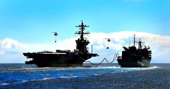 US Navy 100318-N-4774B-884 USS Carl Vinson (CVN 70) conducts a replenishment at sea with USNS Rainier (T-AOE 7)