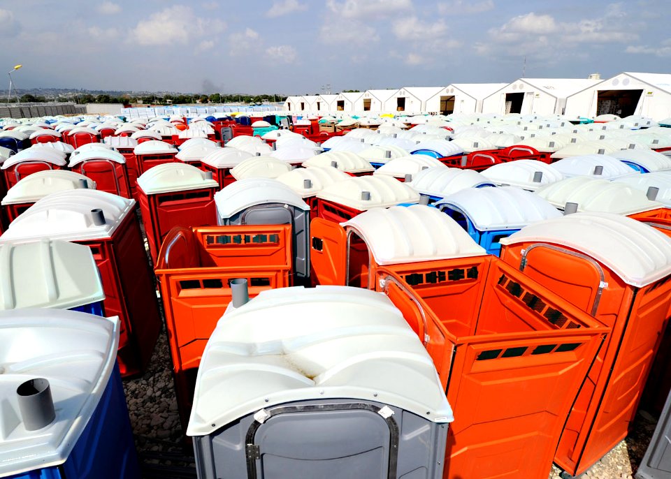 US Navy 100318-N-5961C-001 Port-a-potties built by young Haitians through the United States Agency for International Development (USAID)