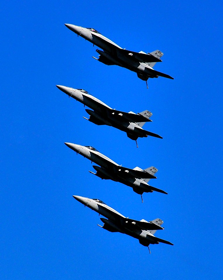 US Navy 100323-N-4774B-277 FA-18E Super Hornets assigned to the Sunliners of Strike Fighter Squadron (VFA) 81 fly in formation during a flight demonstration