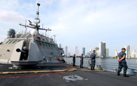 US Navy 100319-N-7058E-135 Sailors man the rails as the littoral combat ship USS Freedom (LCS 1) approaches Cartagena, Colombia to begin a theater security cooperation port visit