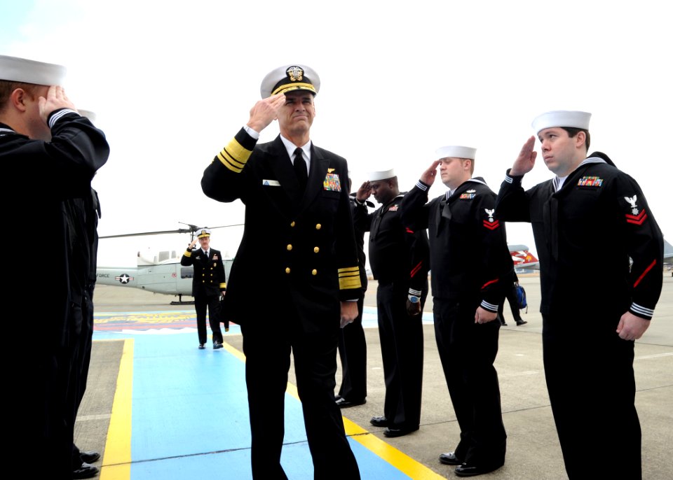 US Navy 100319-N-4031K-050 ice Adm. Thomas Kilcline, commander of Naval Air Forces, is rendered honors as he arrives at Naval Air Facility Atsugi