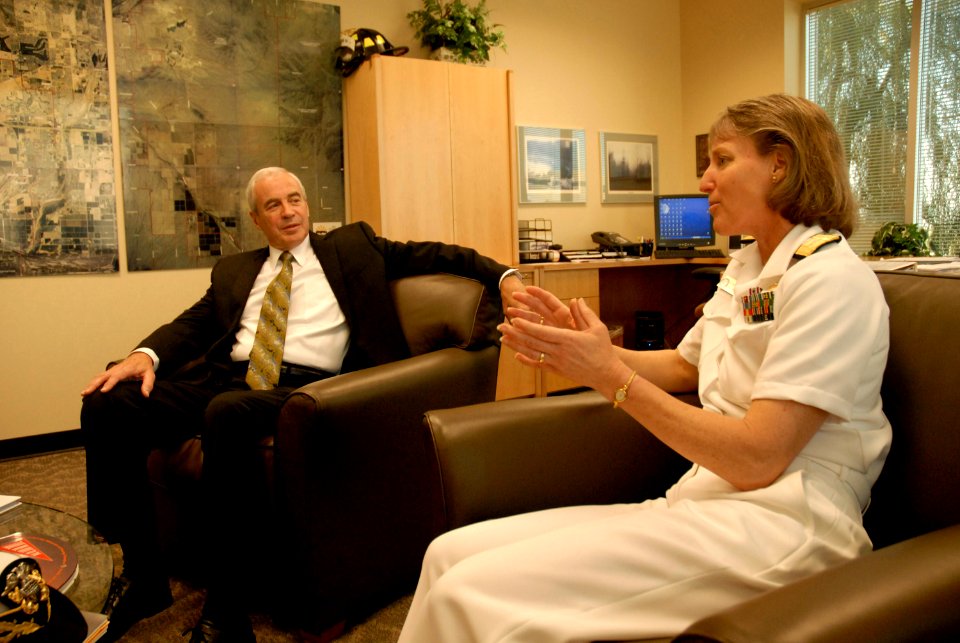 US Navy 100324-N-2389S-034 Rear Adm. Robin Graf, deputy commander of Navy Recruiting Command, discusses Navy capabilities with Jim Cavanaugh, the Mayor of Goodyear, Ariz. Phoenix is one of 20 Navy Weeks planned across America i