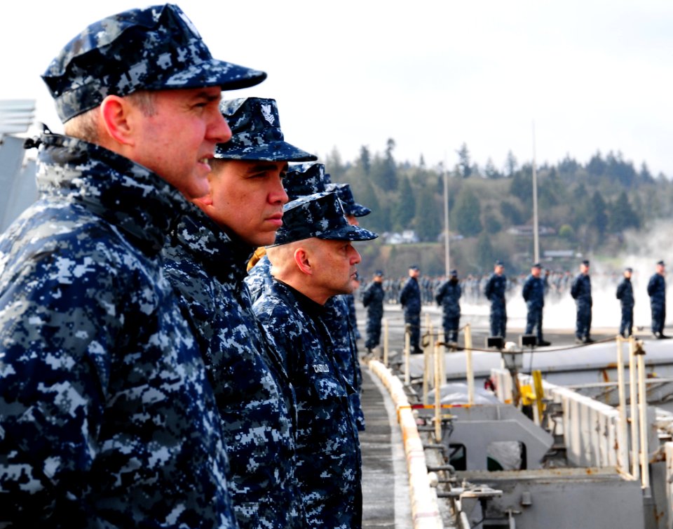 US Navy 100321-N-3327M-045 Sailors aboard the aircraft carrier USS Nimitz (CVN 68) man the rails while arriving at Naval Base Kitsap