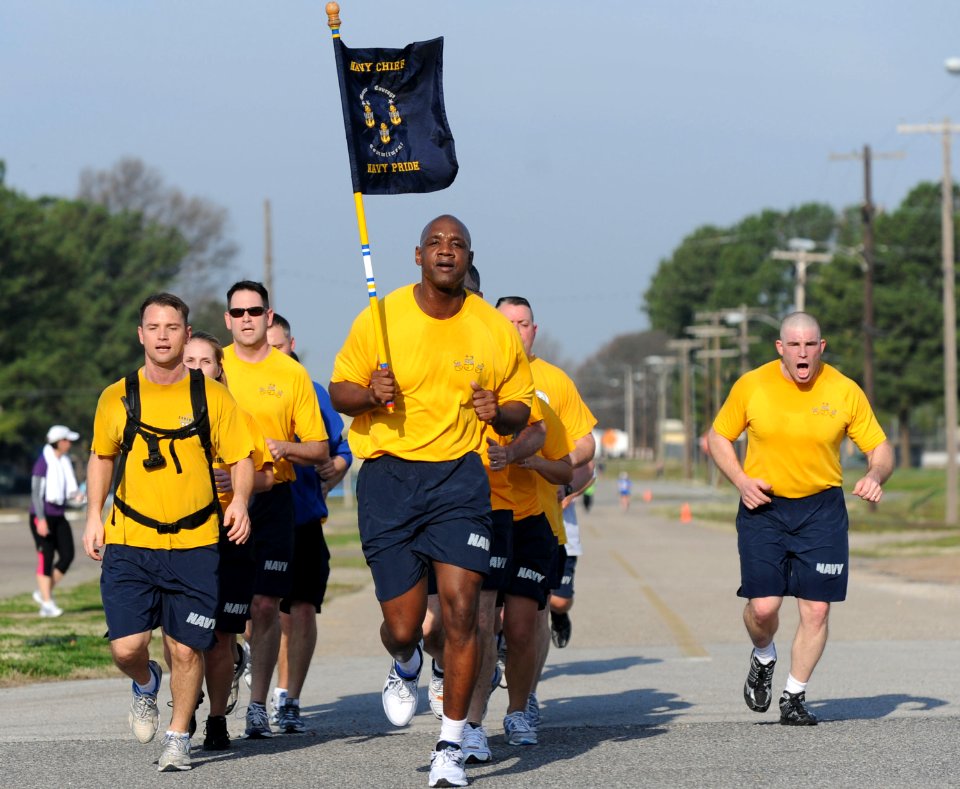 US Navy 100324-N-5862D-003 Chief Petty Officer Greg Fall, right, leads fellow chief petty officers in cadence