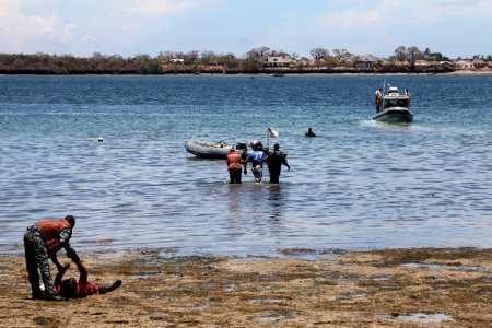 US Navy 100322-N-4205W-101 Members of the Kenya Special Boat Unit transport casualties to their boat to be evacuated during a simulated mass casualty drill