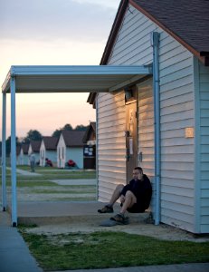 US Navy 100324-N-6932B-483 Information Systems Technician 2nd Class Donald Acker, from Augusta, Kansas, calls home to say good-bye to his wife on his last evening at McCrady Training Center at Fort Jackson, S.C