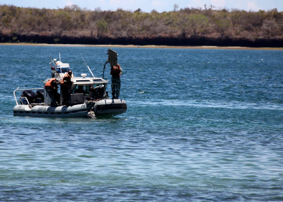 US Navy 100322-N-4205W-036 Members of the Kenya Special Boat Unit prepare to swim ashore to evacuate injured personnel during a simulated mass casualty drill
