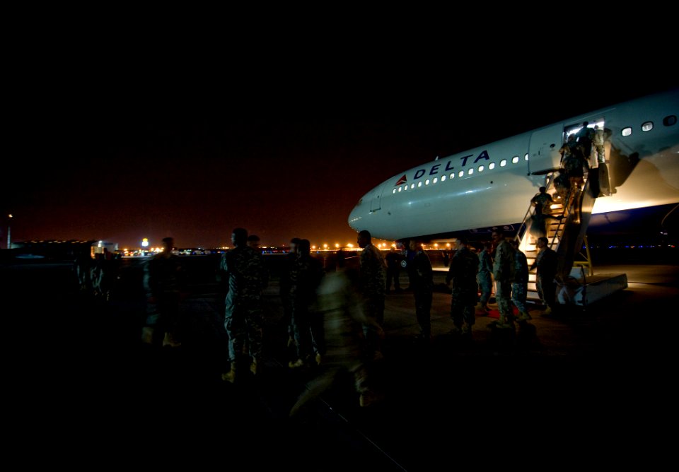 US Navy 100324-N-6932B-707 More than 100 Sailors depart Fort Jackson, S.C. after completing the U.S. Navy Individual Augmentee Combat Training course at the post