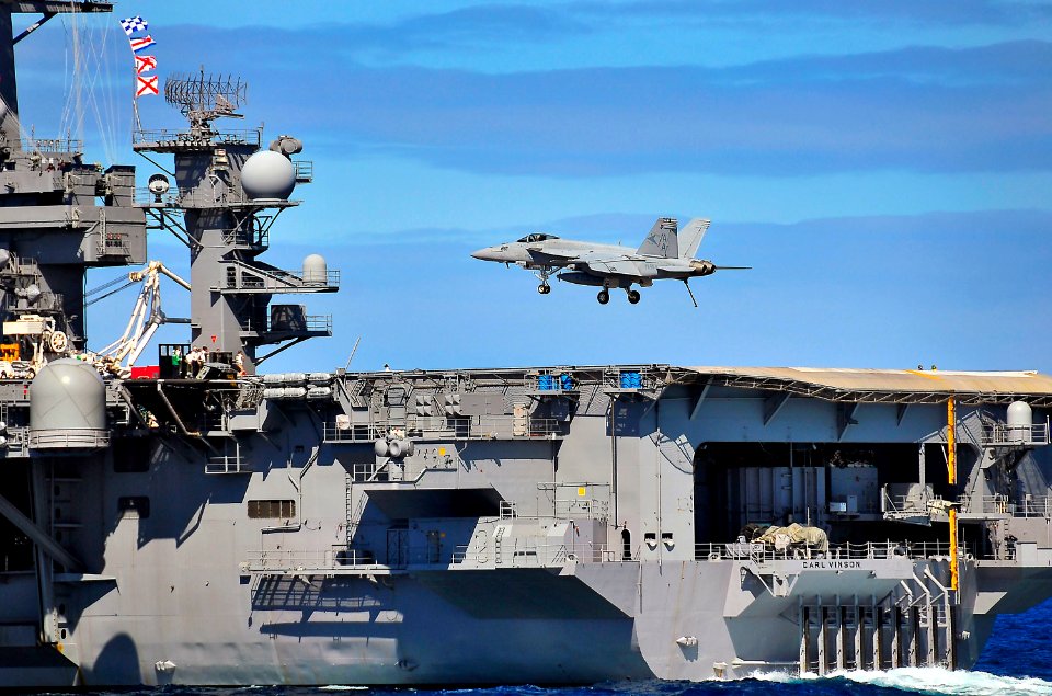 US Navy 100323-N-4774B-324 An FA-18E Super Hornet assigned to the Sunliners of Strike Fighter Squadron (VFA) 81 lands aboard the Nimitz-class aircraft carrier USS Carl Vinson (CVN 70) during a flight demonstration